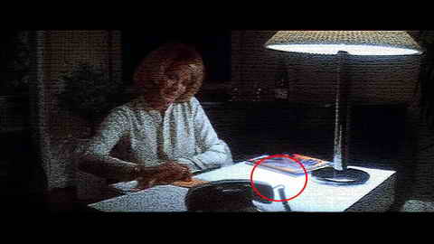 Fehlerbild [02] zum Film 'Dressed to Kill'